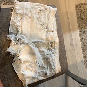 Worn torn light blue Jean shorts size 10